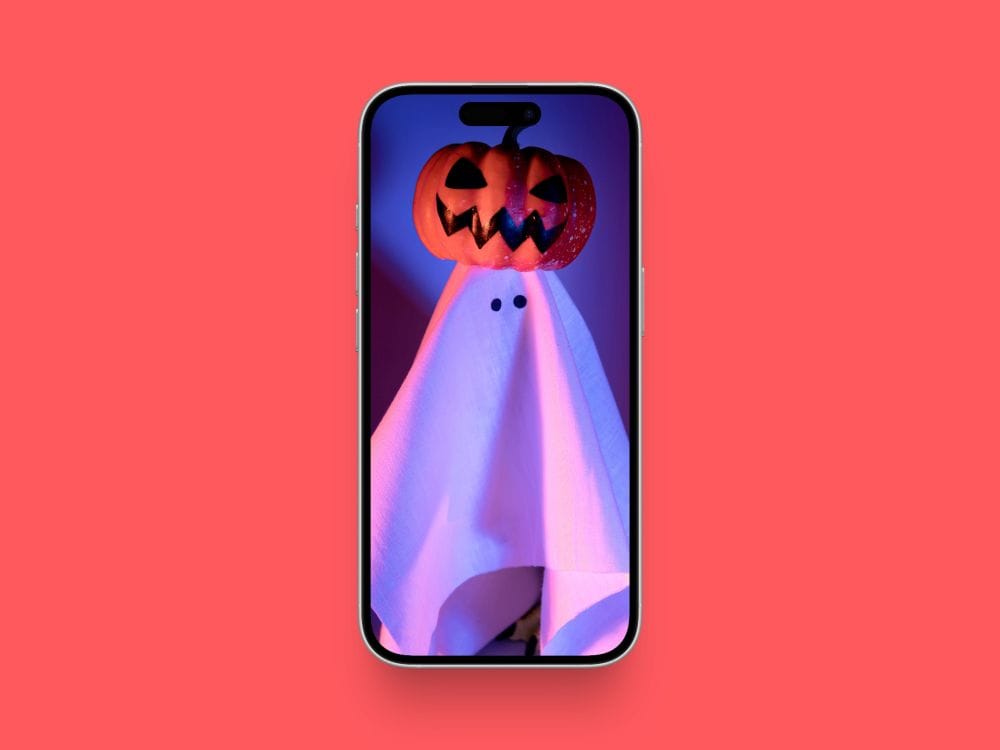 Close-up halloween ghost with pumpkin