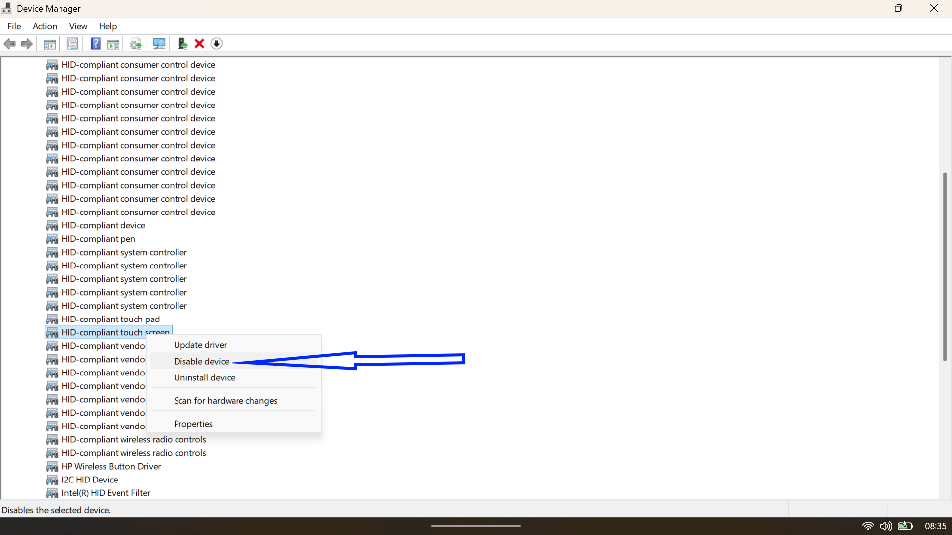 Context menu in Device Manager showing the Disable device option selected for the HID-compliant touch screen driver.