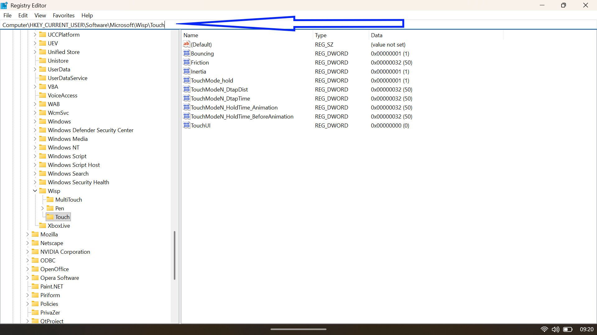 Registry Editor window navigating to the Microsoft Wisp Touch key to modify touch input settings.
