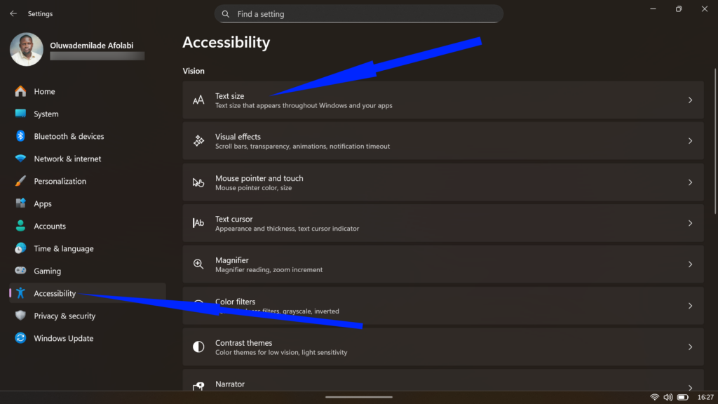 Windows 11 Accessibility settings menu listing vision options like Text size and Visual effects.