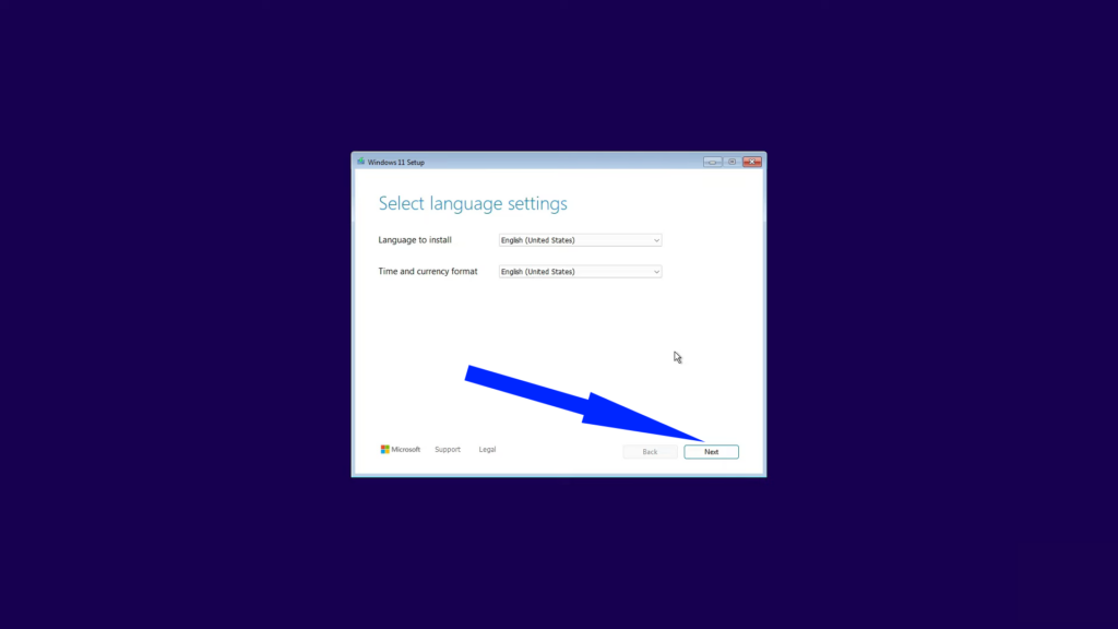 Windows 11 Setup language and time format selection screen.