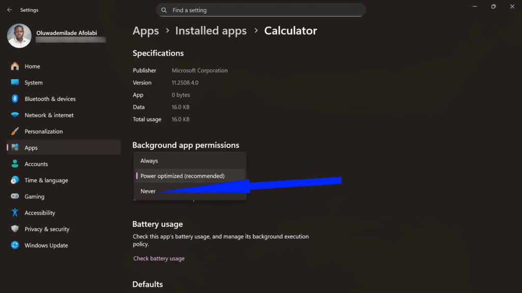 Calculator app specifications screen with an arrow highlighting Never for background app permissions.