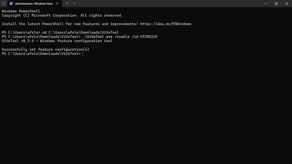 Windows PowerShell window showing a successful feature configuration command executed via ViVeTool.