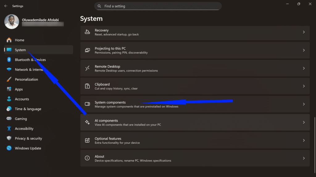 Windows System settings menu with arrows highlighting the System components and AI components sections.