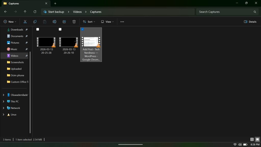 Windows File Explorer displaying a Captures folder containing saved screen recording video files.